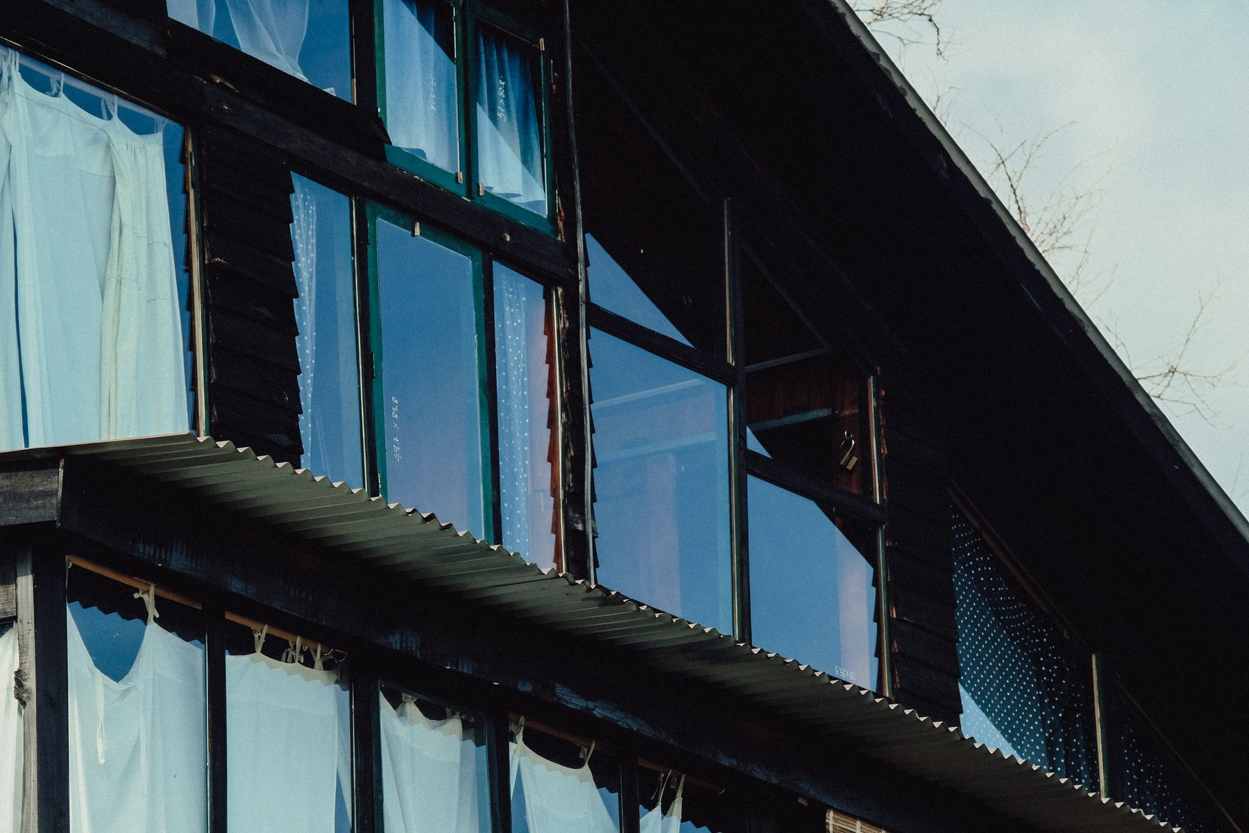 Modern home exterior glass windows in Arden-Arcade CA