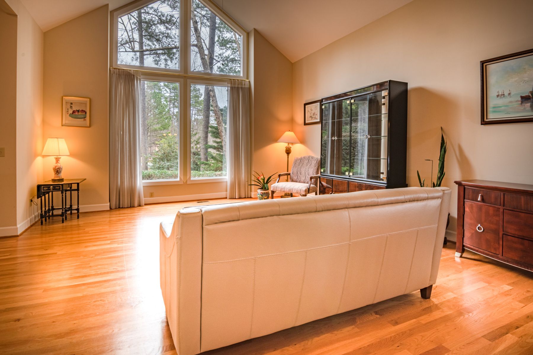 Sunlit living room with large windows in Rio Linda CA